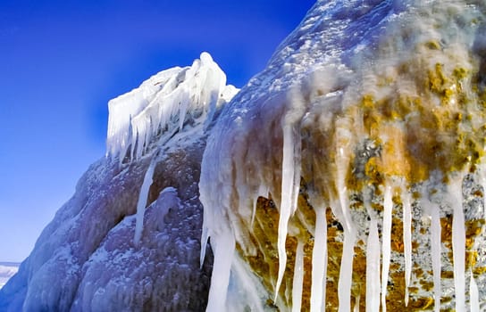 Winter on the Baikal, ice and snow on the lake. The beauty of the nature of Baikal in winter.