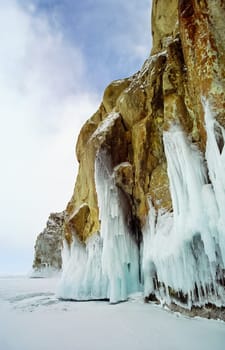 Winter on the Baikal, ice and snow on the lake. The beauty of the nature of Baikal in winter.