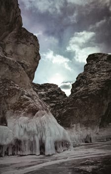 Winter on the Baikal, ice and snow on the lake. The beauty of the nature of Baikal in winter.