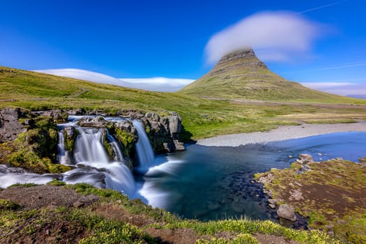 Waterfalls  river  kirkjufell mountain background snaefellsnes peninsula iceland