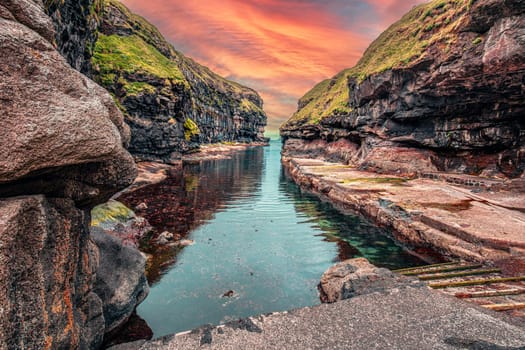 view  ocean inlet  village  gjogv, faroe islands,  dramatic sky rock formations