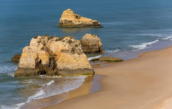 The famous beach of Praia da Rocha in Portimao. This beach is a part of famous tourist region of Algarve.