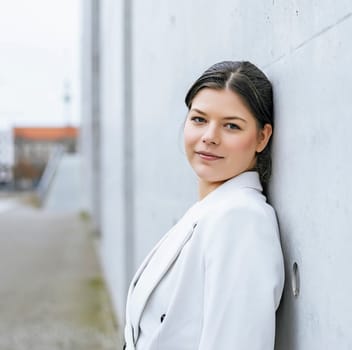 smiling young woman in the city