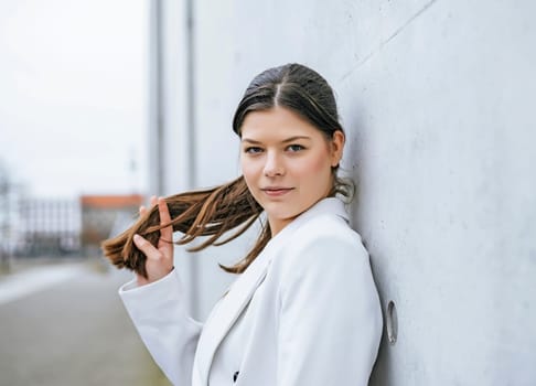 smiling young woman in the city