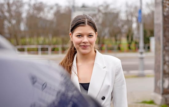 smiling young woman in the city