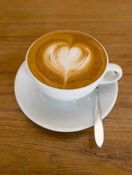 White cup of hot coffee latte, stock photo