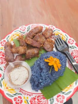 Garlic fried pork dish on the table, stock photo