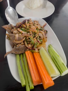 Thai spicy minced pork salad, stock photo
