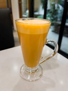 Iced Thai tea topping milk foam, stock photo