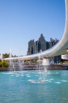Poitiers, France - September 22, 2010: Water jets and Magic Carpet building that looks like an imaginary organ in Futuroscope, a science and technology theme park in Poitiers, France