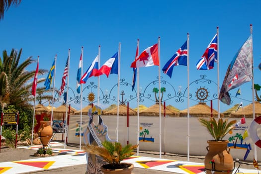 TORREMOLINOS, SPAIN, Andalusia 21 May 2019. Flags at the entrance to Playa Hawai beach in Torremolinos, Malaga province.