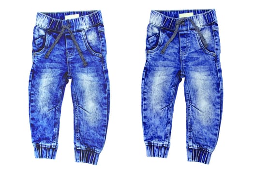 Jeans isolated. Trendy stylish blue denim pants or trousers for child boy isolated on a white background. Clipping path. Jeans winter and autumn fashion.