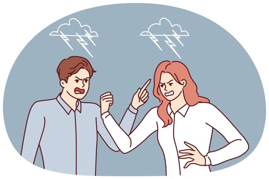Quarrel between man and woman angrily screaming and pointing fingers towards interlocutor. Two colleagues during quarrel related to problems at work or conflict in their personal lives