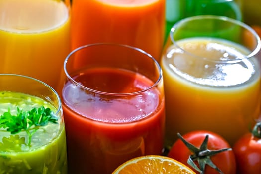 Glasses with fresh organic vegetable and fruit juices. Detox diet