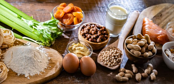Composition with common food allergens including egg, milk, soya, nuts, fish, seafood, wheat flour, mustard, dried apricots and celery