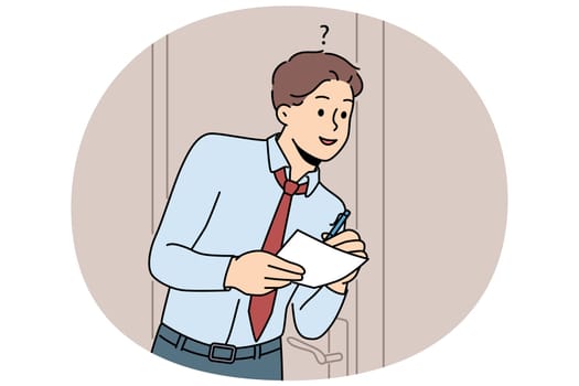 Man eavesdrops on business secrets standing near office door and writing insider information at paper. Guy is spying on boss and trying to get hold of insider data of company or corporation