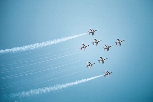 Dinard, France - August 24, 2008: French Air force, formation flying with 8 Alpha Jets of the Patrouille de France at airshow