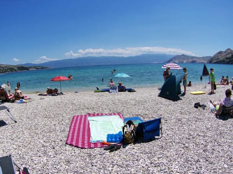 Beach scene in Baska/island of Krk  Theme picture Croatia / Hrvatska / Croatia 2024