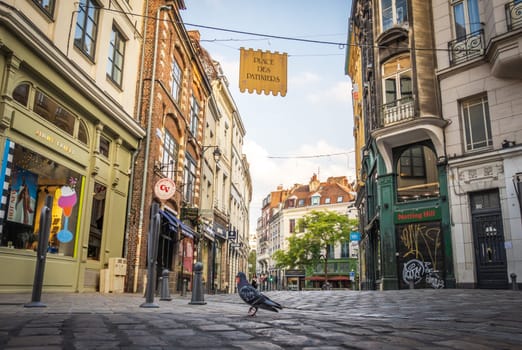 Lille, France - August 18 2022:  Street and shops in the old city of Lille,  Place des Patiniers photographed from the ground