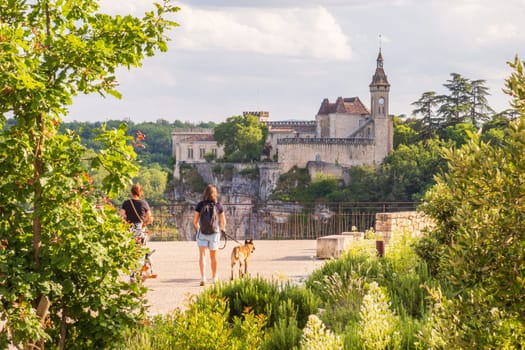 Rocamadour, France - June 17 2024: Girls walking to Citadel of Rocamadour city, famous travel destination in France