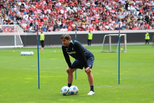 Assistant coach Florian Bruns (SC Freiburg) follows the action at the start of training for Bundesliga club SC Freiburg 2024  DFL REGULATIONS PROHIBIT ANY USE OF PHOTOGRAPHS AS IMAGE SEQUENCES AND/OR QUASI-VIDEONann  Photo: Joachim Hahne/johapress