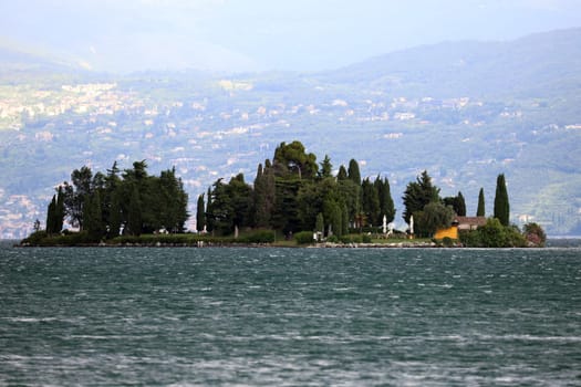 Small island in front of the bay of Manerba del Garada on Lake Garda  Travel Photography - Lake Garda / Lago di Garda / Italy /Italy / Italia