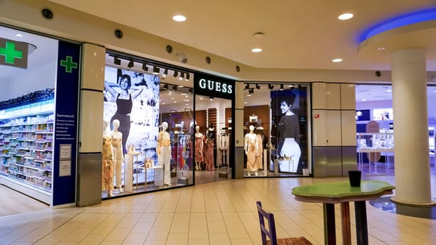 Rimini, Italy - June 25, 2024: Interior of Guess store at Shopping Center le Befane at Rimini at Italy