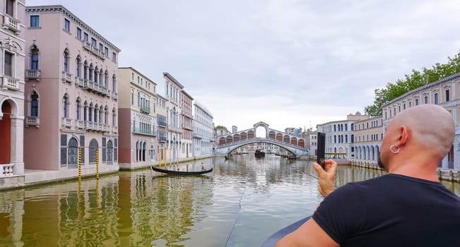 Viserba, Italy - June 25, 2024: Grand Canal at Theme park Italy in Miniature or Italia in Miniatura in Rimini, Italy - Reproduction of famous attractions in a small scale