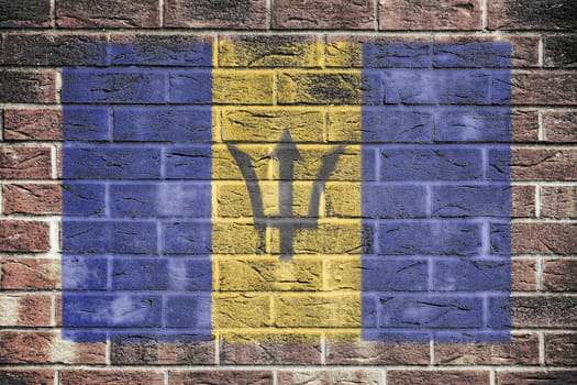 A Barbados flag on a brick wall background