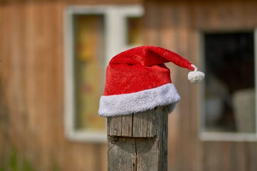 santa Claus hat is put on a pole. High quality photo