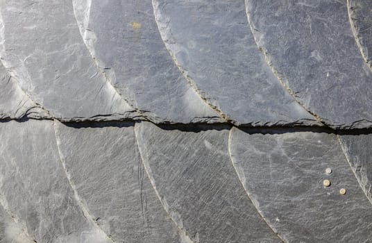 Slate on Facade on facade in detail as background