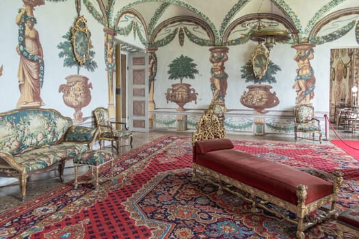 Masino, Italy - April 2023: baroque livingroom in old castle. Vintage interior, original from 18th Century