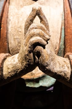 Buddha Statue - Concept of Zen, Spirituality, Peace. Hands gesture, texture light