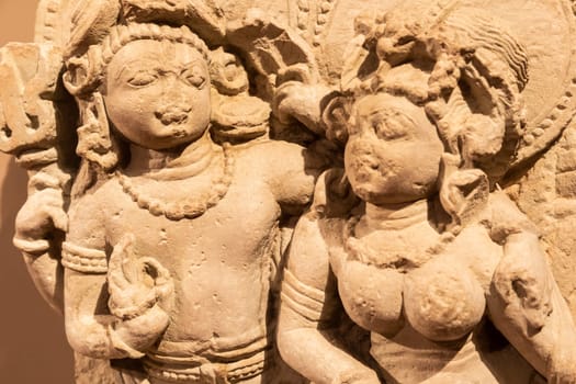 Turin, Italy - May 2023: Oriental Art Museum - Shiva, the Hindu god, with his wife Parvati. Concept for tantra, Kamasutra, tantric sex