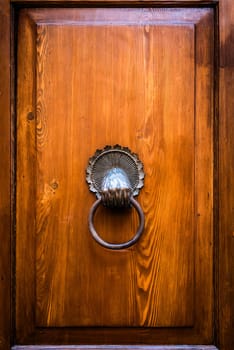 Mysterious old door entrance. Dark light. Abstract concept of secret, horror and magic.