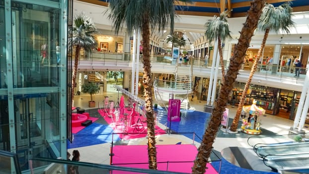Rimini, Italy - June 25, 2024: Le Befane Centre of Commerce. This is the biggest shopping center in Rimini. Unidentified people are shopping.