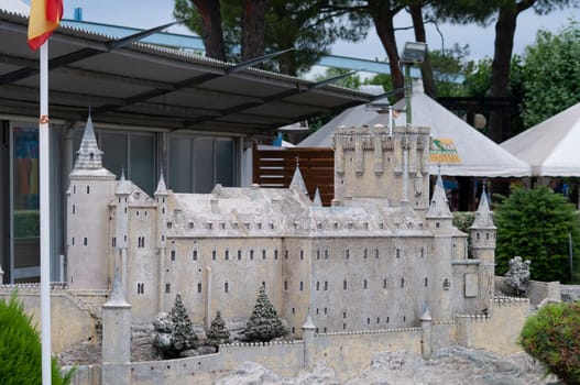 Viserba, Italy - June 25, 2024: The Alcazar de Segovia at Theme park Italy in Miniature or Italia in Miniatura in Rimini, Italy - Reproduction of famous attractions in a small scale