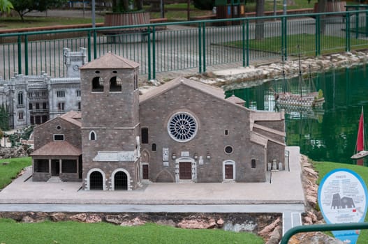 Viserba, Italy - June 25, 2024: CATHEDRAL OF SAN GIUSTO TRIESTE at Theme park Italy in Miniature or Italia in Miniatura in Rimini, Italy - Reproduction of famous attractions in a small scale