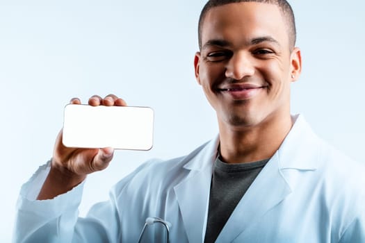 Individual in a white lab coat, confidently holding a smartphone. This military doctor advocates for medical mobile apps, highlighting their significance in modern healthcare