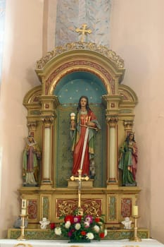 Altar of Saint Barbara in the parish church of the Assumption of the Virgin Mary in Pescenica, Croatia