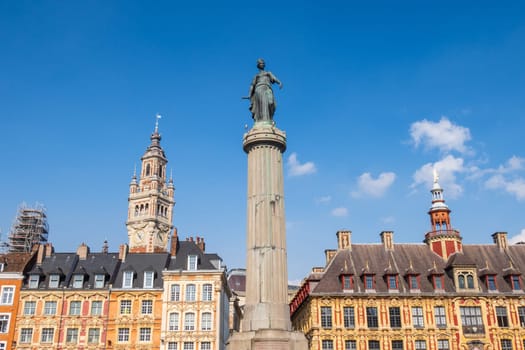 Grand Place in the city of Lille and its belfry over blue sky