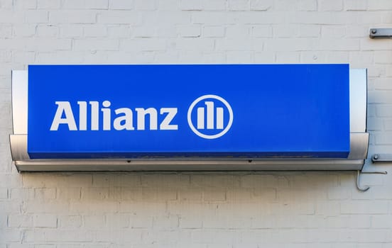 BLANKENBURG, SAXONY-ANHALT, GERMANY- 09-04-2023: ALLIANZ SIGN on a House Facade. Allianz is a European financial services company headquartered in Munich, Germany.