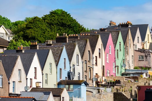 Colorful row of houses in the town and seaport of Cobh (known from 1849 to 1920 as Queenstown) in County Cork, Republic of Ireland.