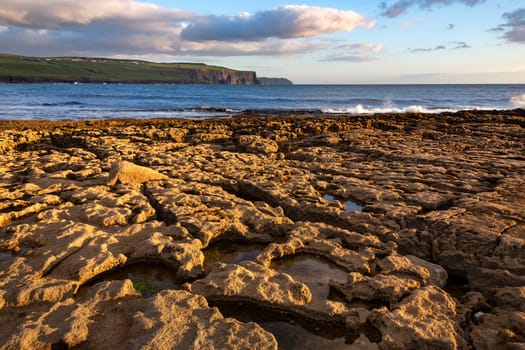 Atlantic coast near Doolin, a coastal village in County Clare, Republic of Ireland. It is southwest of the spa town of Lisdoonvarna.