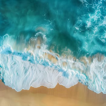 Ocean waves on the beach as a background. Beautiful natural summer vacation holidays background. Aerial top down view of beach and sea with blue water waves