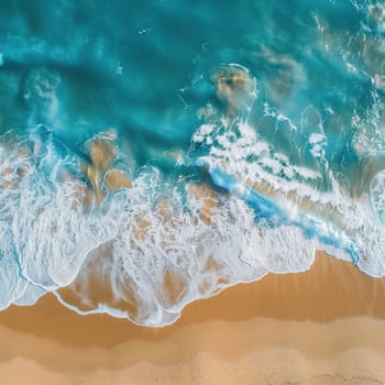 Ocean waves on the beach as a background. Beautiful natural summer vacation holidays background. Aerial top down view of beach and sea with blue water waves