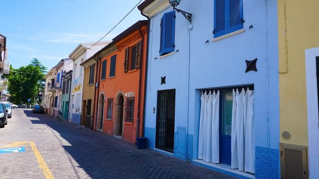 Borgo San Giuliano typical street with low and colorful houses at Rimini, Italy