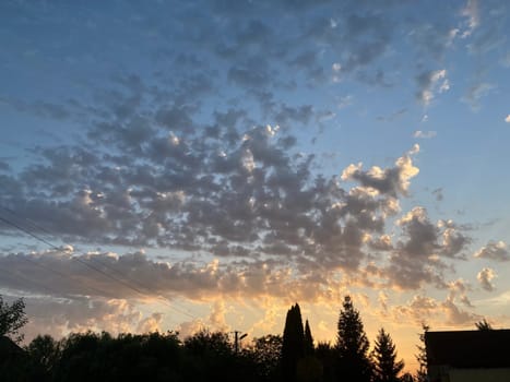 Clouds at sunset on a the hot summer day
