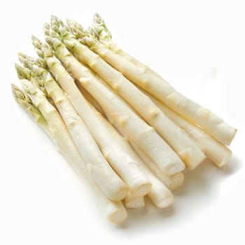 Fresh white asparagus on a bright background, highlighting the natural texture and tips of the spears