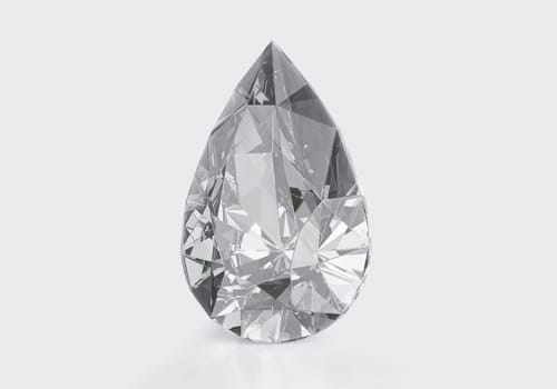 Diamond with reflection on white background